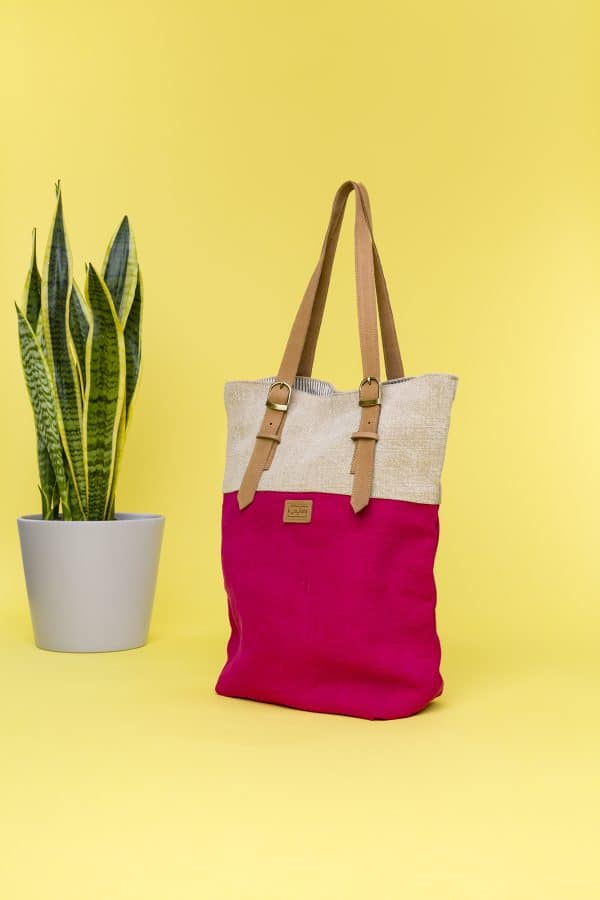 Kwooksta soft jute classic tote side view in red and natural with adjustable eco leather shoulder straps