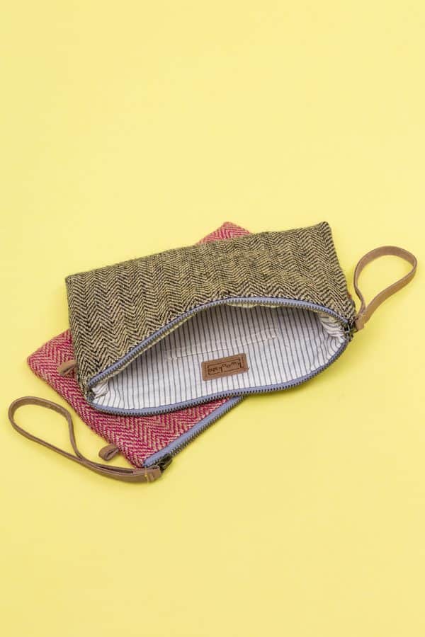 Kwooksta herringbone jute clutch pouch in red and black with eco leather wrist strap and organic cotton striped inner lining