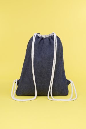 Kwooksta soft jute drawstring bag back view in grey and natural with white cotton straps