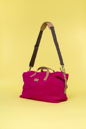 Kwooksta soft jute little weekender bag side view in red with eco leather handles and adjustable cotton shoulder strap